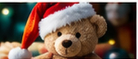 A teddy bear in a Santa hat