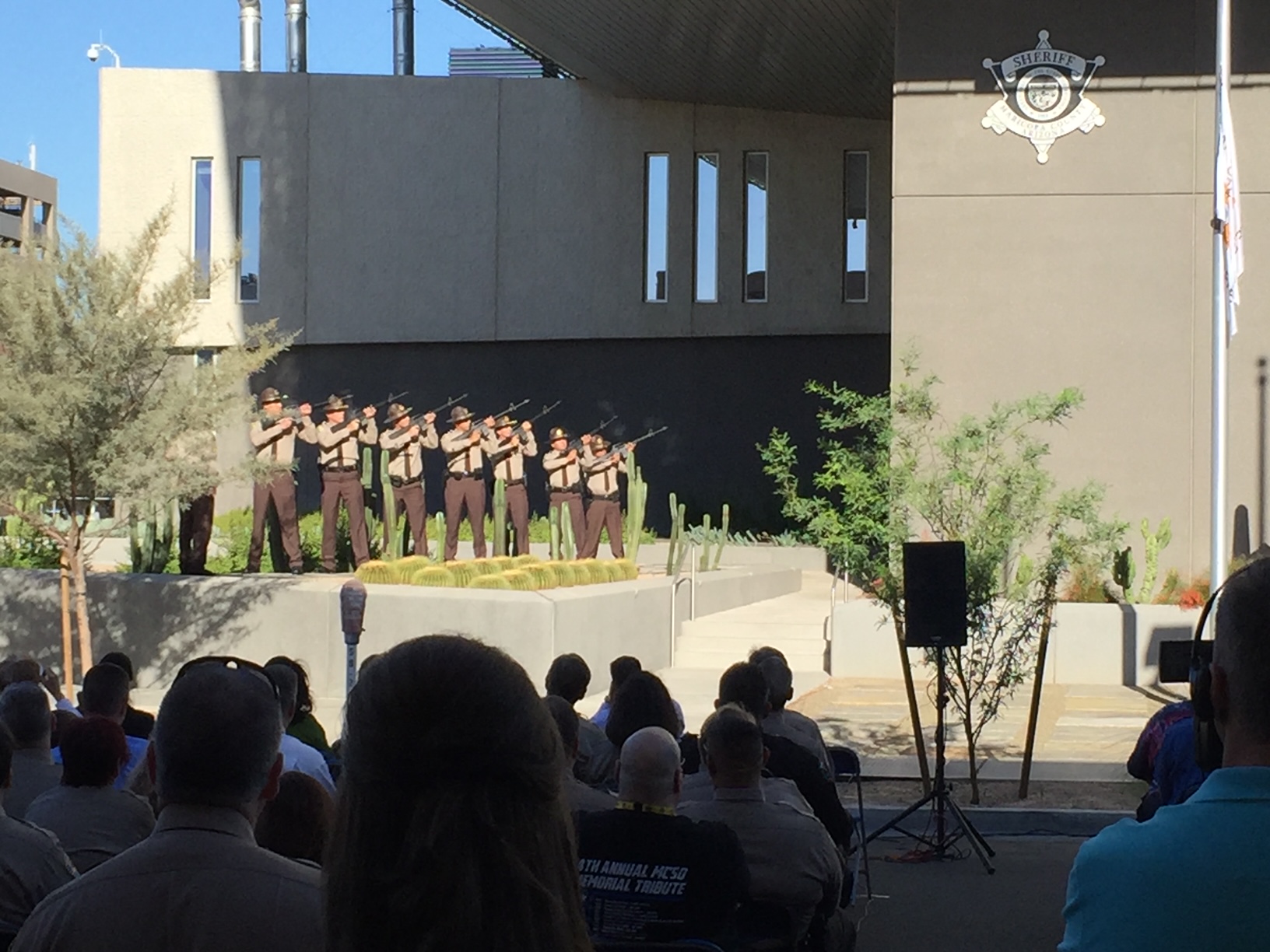 Deputies and families at an MCSO memorial ceremony